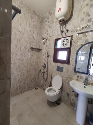 Bathroom in 2.5 BHK Apartment at Vasant Kunj – for Rent