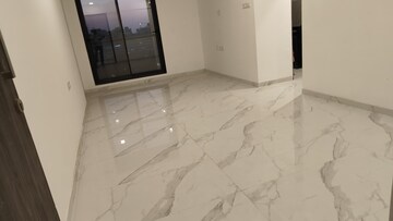 Living Room in 2 BHK Apartment at Dev Leo Tower, Oshiwara – for Rent