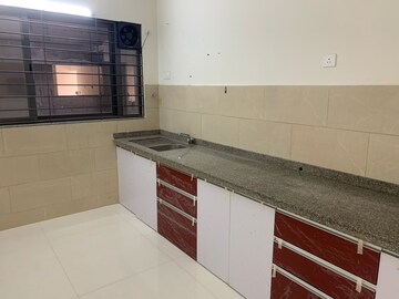 Kitchen in 2 BHK Apartment at Kumar Palmsprings, Undri – for Rent