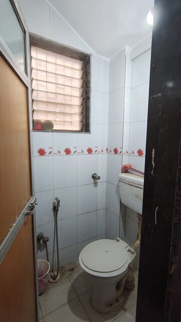 Bathroom in 1 RK Apartment at Karvir CHS, Dahisar East – for Rent