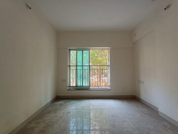 Bedroom in 2 BHK Apartment at Rustomjee Urbania, Majiwada – for Sale
