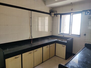 Kitchen in 2 BHK Apartment at Whispering Heights, Malad West – for Rent