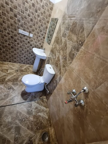 Bathroom in 2 BHK Apartment at Prateek Grand Paeonia, Krishna Vihar – for Rent