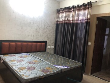 Bedroom in 2 BHK Apartment at Prateek Grand Carnesia, Siddharth Vihar – for Rent