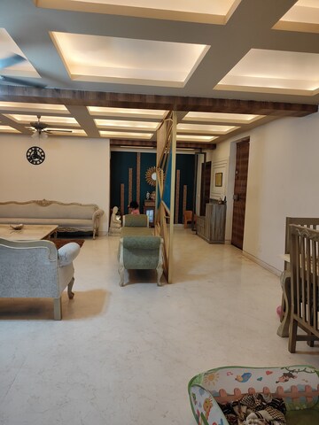 Living Room in 4 BHK Apartment at Ansal API Esencia, Sector 67 – for Rent