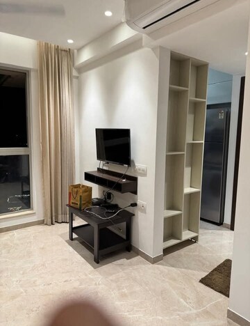 Living Room in 1 BHK Apartment at Hiranandani Regent Hill, Powai – for Rent
