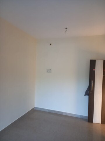 Room in 2 BHK Apartment at Mohan Suburbia, Ambernath West – for Rent
