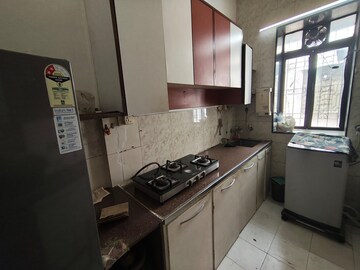 Kitchen in 2 BHK Apartment at Jaypee Greens Aman, Sector 151 – for Sale
