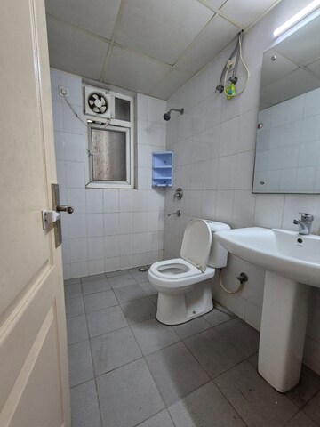 Bathroom in 3 BHK Apartment at Dhoot Time Residency, Sector 63 – for Rent