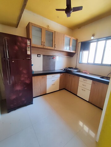 Kitchen in 2 BHK Apartment at Dedhia Platinum Lawns, Ghodbunder Road – for Rent