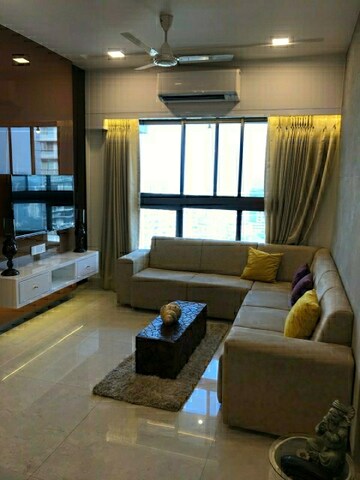 Living Room in 1 BHK Apartment at Ruparel Celestia, Mulund East – for Sale