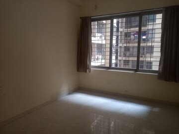 Bedroom in 2 BHK Apartment at Vishesh Balaji Symphony, New Panvel – for Rent