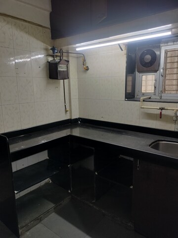 Kitchen in 2 BHK Apartment at Adarsh Nagar CHS Worli, Worli – for Rent