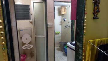 Bathroom in 1 BHK Apartment at Nagari Niwara CHS, Goregaon East – for Rent