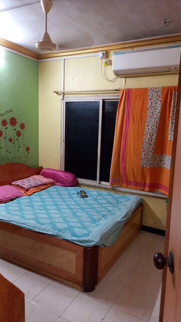 Bedroom in 1 BHK Apartment at Nagari Niwara CHS, Goregaon East – for Rent