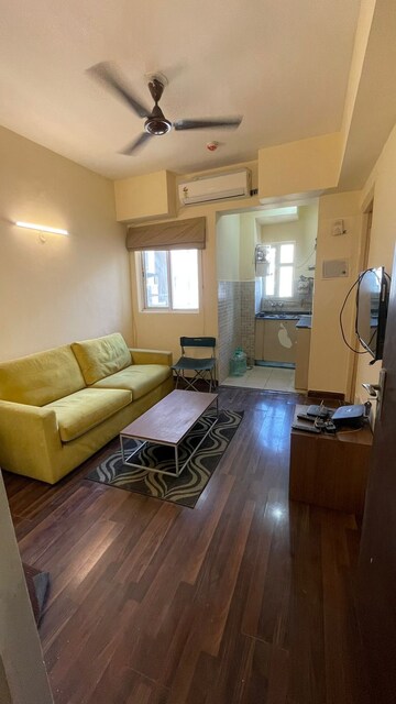 Living Room in 1 BHK Apartment at Paras Tierea, Sector 137 – for Rent