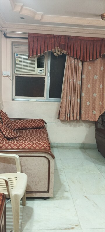 Living Room in 1 BHK Apartment at Vile Parle West – for Rent