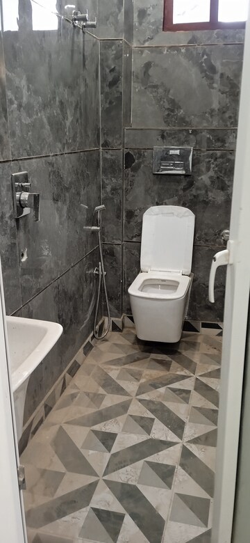 Bathroom in 3 BHK Apartment at Mahavir Enclave 1 – for Sale