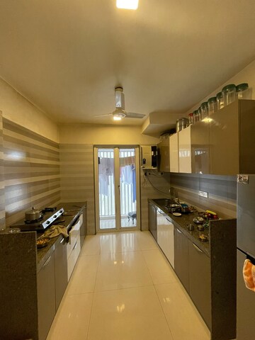 Kitchen in 3 BHK Apartment at Paradigm Nivan, Khar West – for Rent