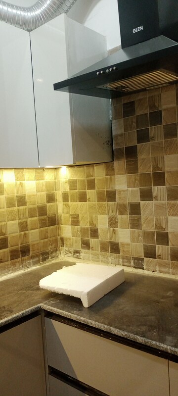 Kitchen in 1.5 BHK Apartment at Prateek Grand Carnesia, Siddharth Vihar – for Rent