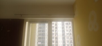 Room in 2 BHK Apartment at Prateek Grand Paeonia, Krishna Vihar – for Rent