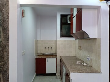 Kitchen in 1 BHK Apartment at Khirki Extension – for Sale
