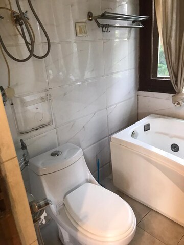 Bathroom in 2 BHK Apartment at Panchsheel Park – for Rent