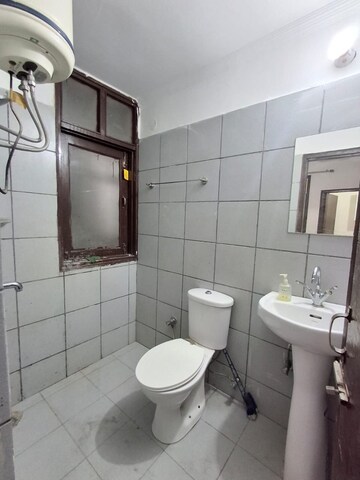 Bathroom in Studio Apartment at Maya Garden City, Lohgarh – for Rent