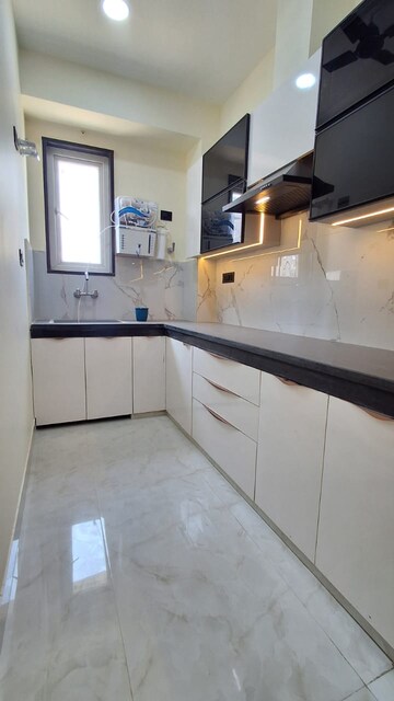 Kitchen in 2 BHK Builder Floor at Ansal Sushant Apartments, Sushant Lok I – for Rent