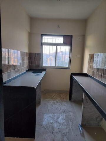 Kitchen in 2 BHK Apartment at Shivshankar Shivram Palladium, Bhandup West – for Sale