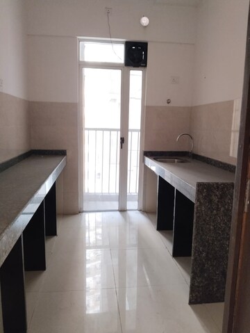 Kitchen in 2 BHK Apartment at Marathon Nexzone, New Panvel – for Rent