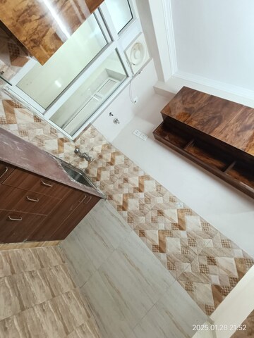 Kitchen in 2.5 BHK Apartment at Amrapali Golf Homes, Sector 4, Greater Noida – for Rent