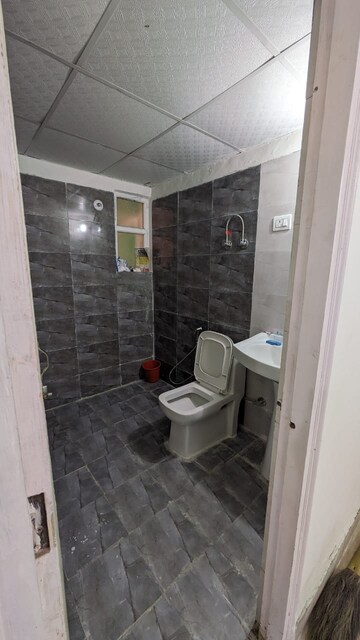 Bathroom in 2 BHK Apartment at Migsun Roof, Raj Nagar Extension – for Sale