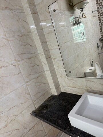 Bathroom in 3.5 BHK Builder Floor at RWA Residential Society Sector 46, Sector 46 – for Rent