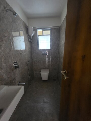 Attached Bathroom in 1 BHK Apartment at Vadgama Kings Tower, Agripada – for Sale