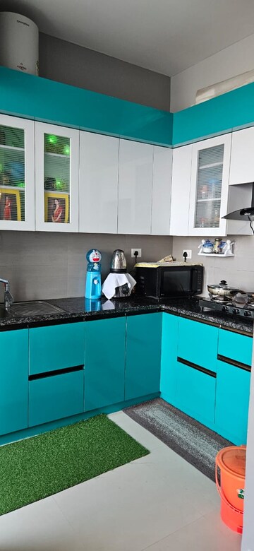 Kitchen in 4 BHK Apartment at Auram Floor, South City 2 – for Rent