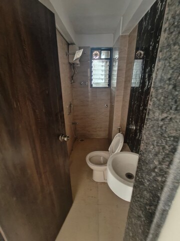Bathroom in 2 BHK Apartment at Yasmin Tower, Agripada – for Sale