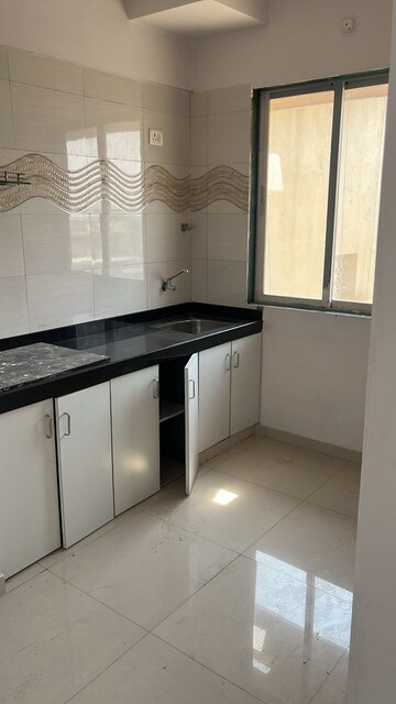 Kitchen in 1 BHK Apartment at Mohid Swiz Heights, Andheri West – for Rent