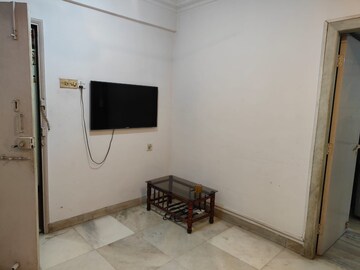 Living Room in 1 BHK Apartment at Harmony CHS Powai, Powai – for Rent