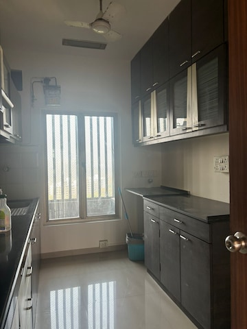 Kitchen in 2.5 BHK Apartment at Oberoi Realty Woods, Goregaon East – for Rent