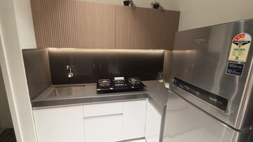 Kitchen in 1 BHK Apartment at Rustomjee Global City – for Sale