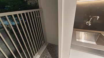 Balcony in 1 BHK Apartment at Rustomjee Global City – for Sale