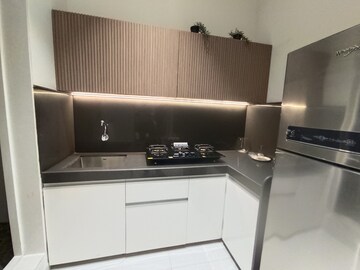 Kitchen in 1 BHK Apartment at Rustomjee Global City – for Sale