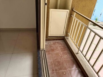 Balcony in 1 BHK Apartment at Rustomjee Global City – for Sale