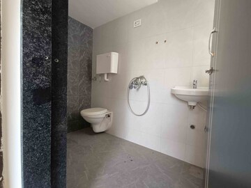 Bathroom in 1 BHK Apartment at Rustomjee Global City – for Sale
