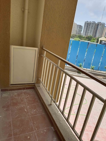 Balcony in 1 BHK Apartment at Rustomjee Global City – for Sale