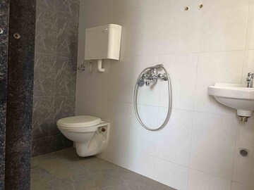Bathroom in 1 BHK Apartment at Rustomjee Global City – for Sale