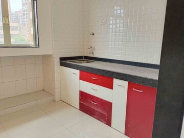 Kitchen in 1 BHK Apartment at Rustomjee Global City – for Sale