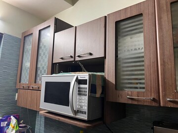 Kitchen in 2 BHK Apartment at Tharwani Rosewood Heights, Kharghar Sector 10 – for Rent