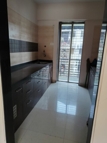 Kitchen in 2 BHK Apartment at Sanghvi Arham Arcade, Kharghar – for Rent